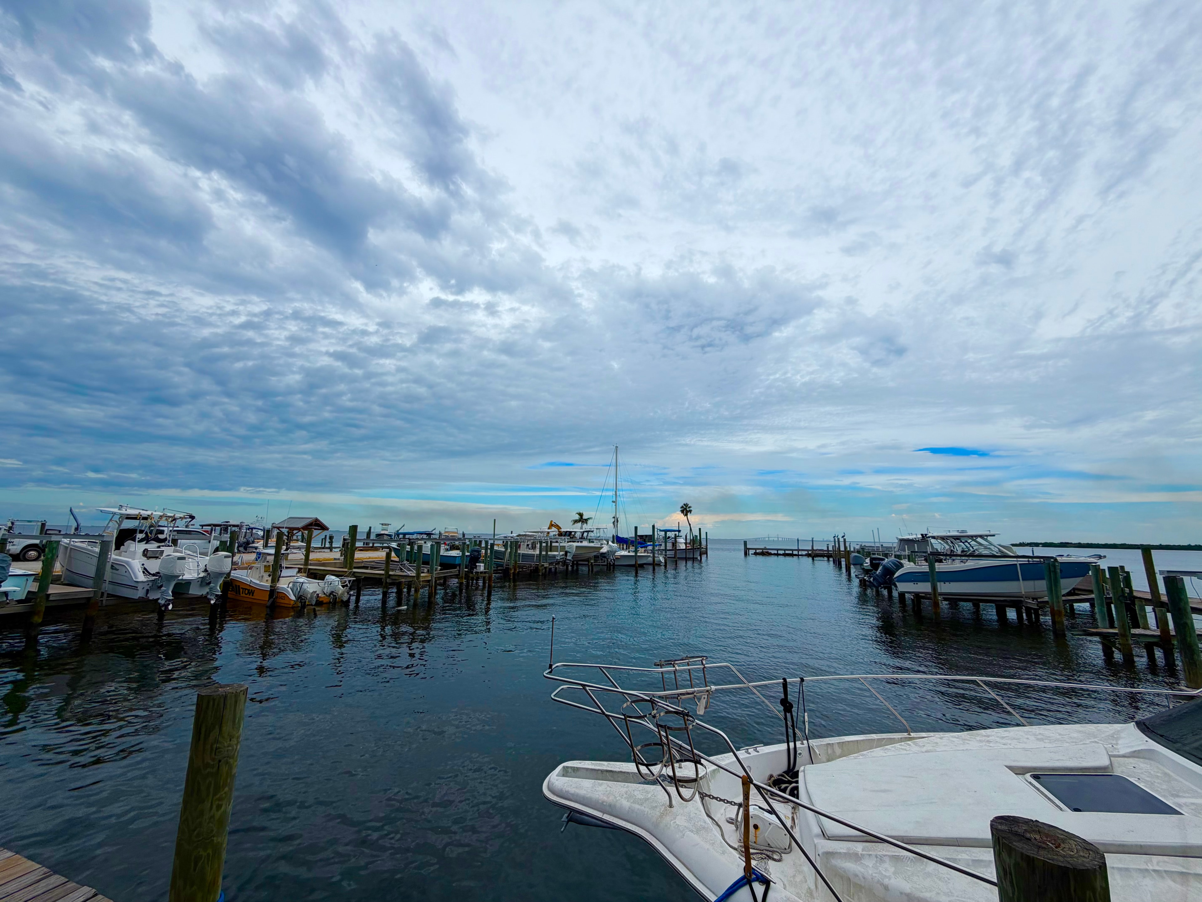 Wide view of Blenker Boatworks marina with boats at dock